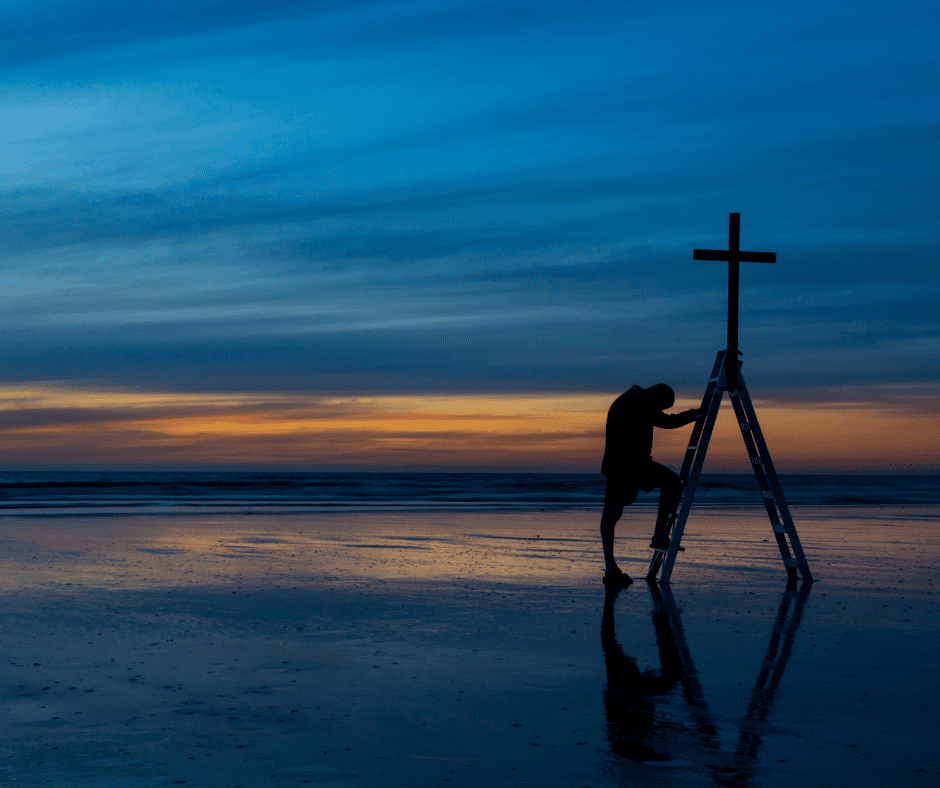 praying at cross beach
